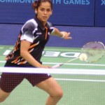 XIX Commonwealth Games-2010 Delhi: Indian shuttler Saina Nehwal in action against her Barbados opponent during their match in the preliminary round of badminton event, at Sirifort Sports Complex, in New Delhi on October 05, 2010.